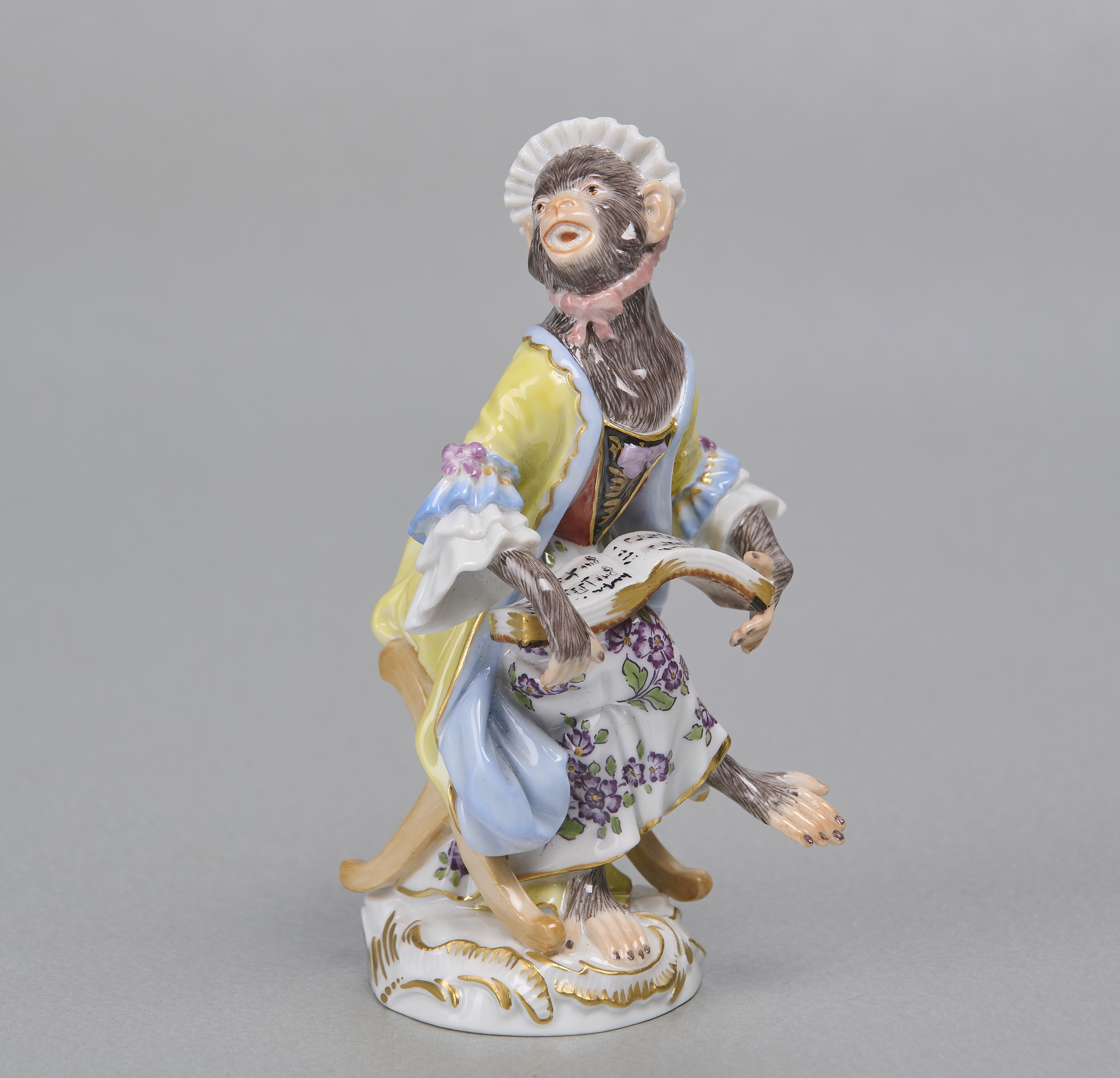Meissenfigur, Affenkapelle, Sängerin mit gelbem Kleid, 1. Wahl Meissenfigur, Affenkapelle, Sängerin mit gelbem Kleid, 1. Wahl